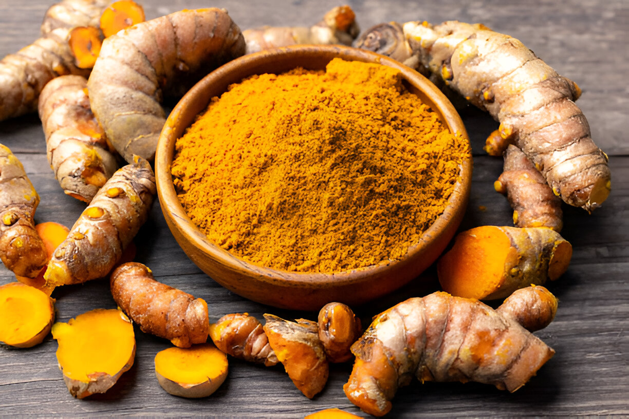 close-up of whole and powdered turmeric